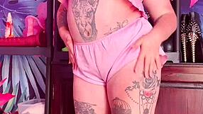 Teasing in silk pajamas with a curvy figure