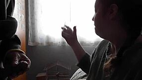 He enjoys sucking and swallowing a refreshing drink in a glass.