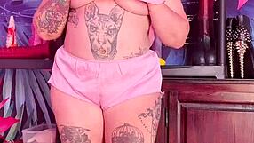 Teasing in silk pajamas with a curvy figure