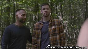 A hot worker joins a gay couple for a steamy fuck train session in the woods