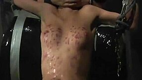 Bondage slave gags on master's cock after rough garage fucking