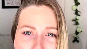 blonde girl plays with big dildo on camera