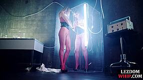 Lezdom mistress queening submissive in fishnets and lingerie