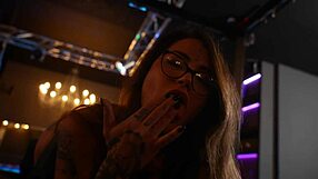 Beautiful tattooed woman gets BDSM sex in a studio
