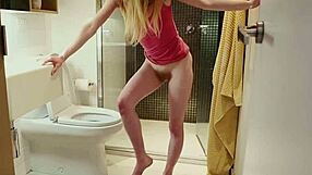 Watch this cute redhead pee before fucking herself with her dildo