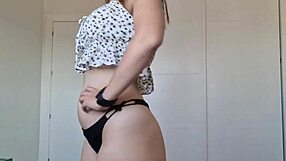 Blonde latina in panties shows sexy ass