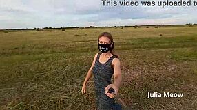 Can you resist Juli Smith undressing in the field?