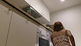 Hot redhead latina wife teases in kitchen without panties, showing big ass and pussy in summer dress.