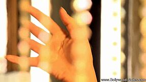 A Dancer From India Slowly Undresses, Teasing With Her Moves.