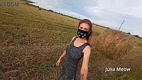 Can you resist Juli Smith undressing in the field?