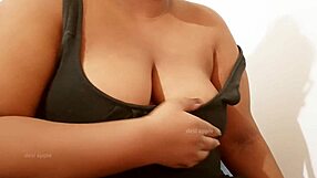 Indian Aunty Teases with Sexy Boobs on Display