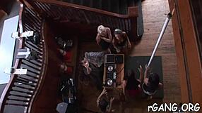 Girl and dude engage in intense oral sex, sucking and licking each other's genitals passionately in a group setting