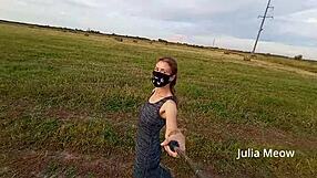 Can you resist Juli Smith undressing in the field?