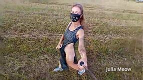 Can you resist Juli Smith undressing in the field?