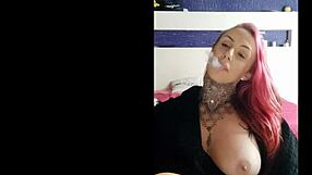 sensual tattooed wife smoking and teasing big natural tits on webcam