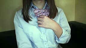 Hitomi Kamei in uniform cosplay for a shaved session