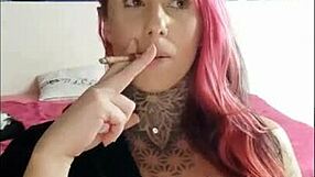 sensual tattooed wife smoking and teasing big natural tits on webcam