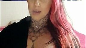sensual tattooed wife smoking and teasing big natural tits on webcam