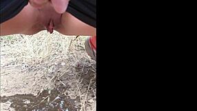 Sofie Marie's natural tits get pissed on outdoors – kinky milf contrast.