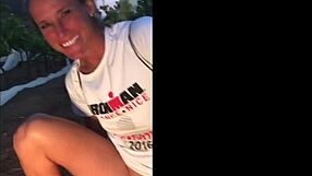 Sofie Marie's natural tits get pissed on outdoors – kinky milf contrast.