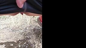 Sofie Marie's natural tits get pissed on outdoors – kinky milf contrast.