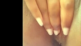 Ebony woman chats online while touching herself