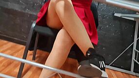 Watch Nataly's Upskirt Pussy Hairs Peek Out Under Her Miniskirt!