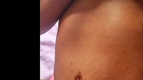 Ebony woman chats online while touching herself