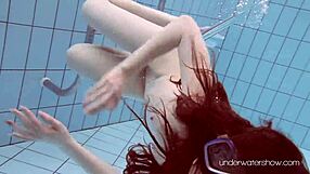 underwater babe roxalana cheh strips in bikini