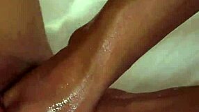 A cute lesbian Eurobabe with huge tits engages in intense fisting