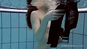 underwater babe roxalana cheh strips in bikini