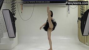 Flexyteen Markova stretches naked in gym