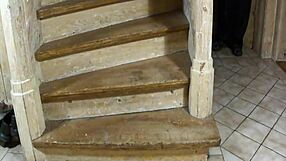 Red ass from spanking at home on the stairs