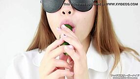 Asian women enjoy making sounds while eating cucumbers