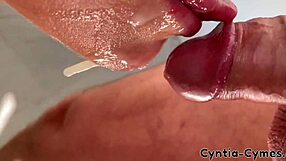 Milf gives blowjob while watching porn on laptop, cum in mouth