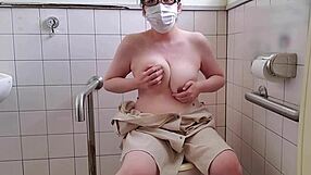 A married woman with big Asian tits has a hot solo scene on the toilet
