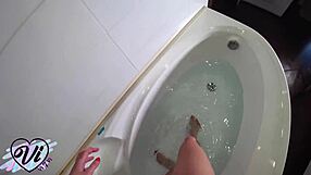 teen girl touches herself in bathroom underwater