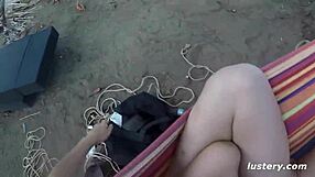 Couple enjoys kinky outdoor hammock activity