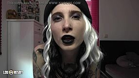 In a German parking spot, Lou Nesbit and Lia Louise dominate a male slut with dirty talk and femdom play.