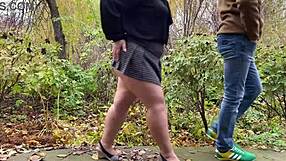Fat MILF in Short Skirt Holds Dick While Peeing Publicly