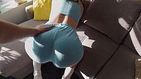 Beautiful brunette gets stuck in the couch and her big natural tits are exposed