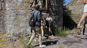 nude tattooed model poses at military base