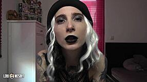 In a German parking spot, Lou Nesbit and Lia Louise dominate a male slut with dirty talk and femdom play.