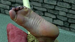 Bound in barefoot restraint.