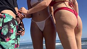 two girls help me masturbate on beach