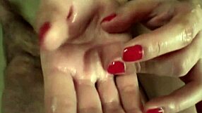 Hot Japanese babe with natural tits gives closeup handjob action