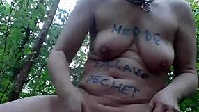 Whore Slave Masturbates Outdoors in BDSM Forest