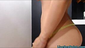 Watch this slutty Latina bounce her ass in cowgirl position on a dildo webcam show.