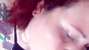 The redhead slut receives cum all over her tits from friend's big cock