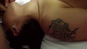 Tattooed Brunette in Heels Deepthroats Thick Cock